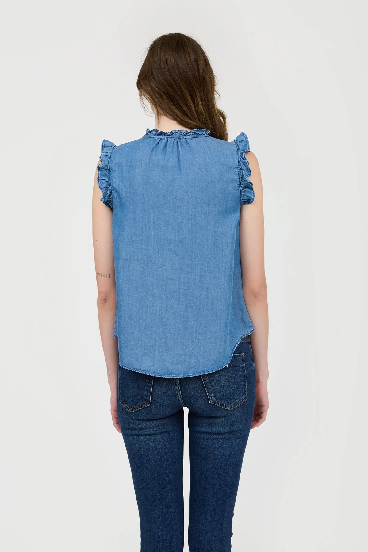 CHAMBRAY RUFFLE TIE FRONT SLEEVELESS BLOUSE